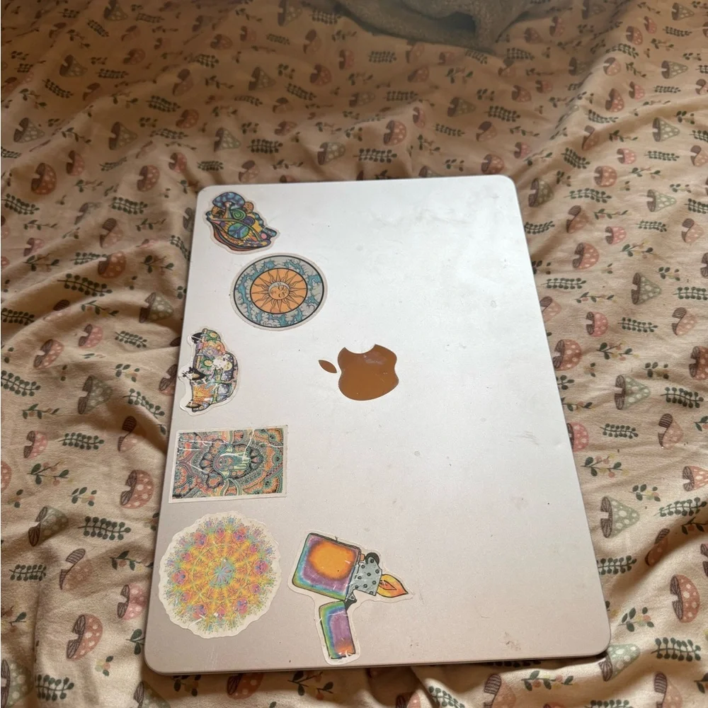 Apple MacBook with Artistic Stickers